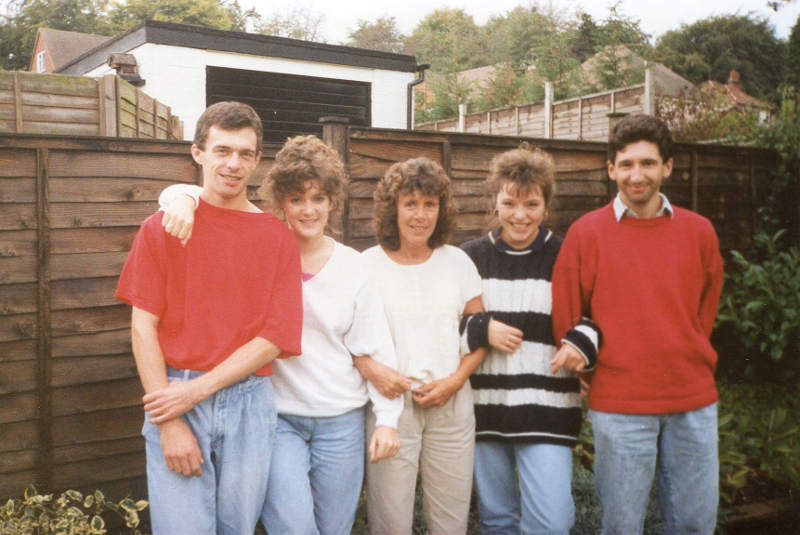 Photo of John and his family taken around 1980